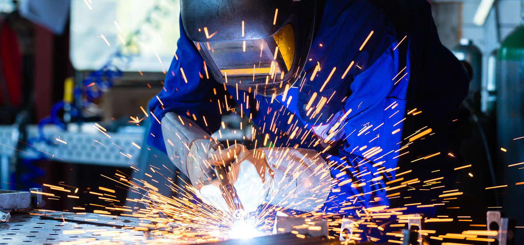 Welder fabricating with steel tubes